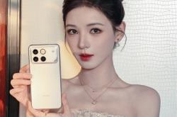 张予曦晒出荣耀WIN 网友：人美 机器也美